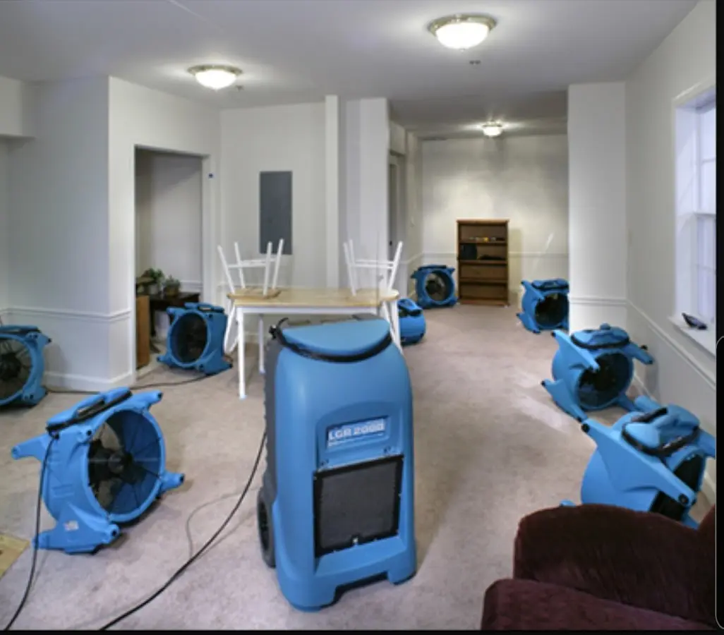 Air movers and dehumidifier setup for Water Damage Restoration in Solon